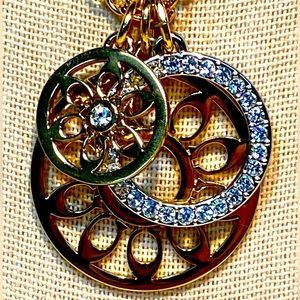 Coach Multi Circle Gold Tone & Pave Pendant Necklace.